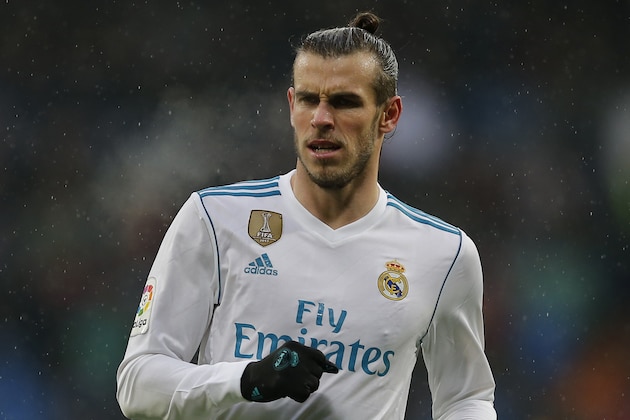 Real Madrid's Gareth Bale runs into position during a Spanish La Liga soccer match between Real Madrid and Villarreal at the Santiago Bernabeu stadium in Madrid, Spain, Saturday, Jan. 13, 2018. (AP Photo/Paul White)