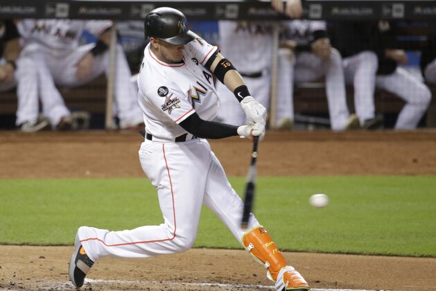 Miami Marlins' Miguel Rojas bats during a baseball game against the Atlanta Braves, Sunday, Oct. 1, 2017, in Miami. (AP Photo/Lynne Sladky)