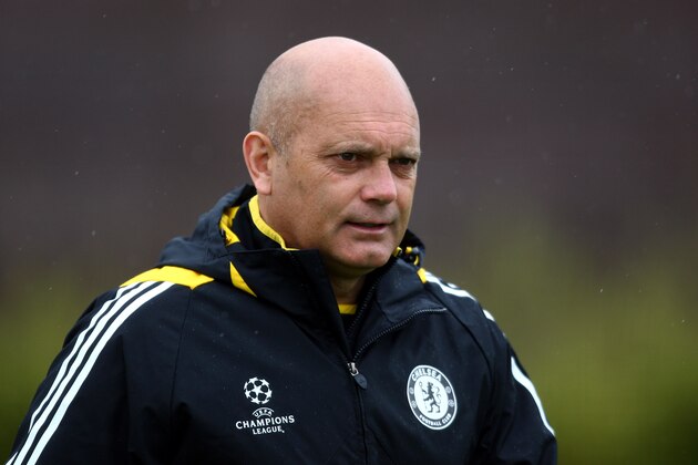 FILE - In this Monday, April 27, 2009 file photo, Chelsea assistant manager Ray Wilkins walks out to a training session at their training ground, Cobham, England. With finding a job in England harder due to the influx of foreign coaches, Ray Wilkins hopes working abroad himself can revitalize his career. The former England midfielder, who was fired as Fulham assistant manager in February, has been hired on a short-term deal by Jordan.  Wilkins told The Associated Press on Monday, Sept. 8, 2014,  that