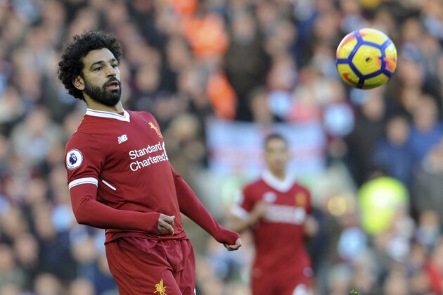 Liverpool's Mohamed Salah during the English Premier League soccer match between Liverpool and West Ham United at Anfield in Liverpool, England, Saturday, Feb. 24, 2018. (AP Photo/Rui Vieira)