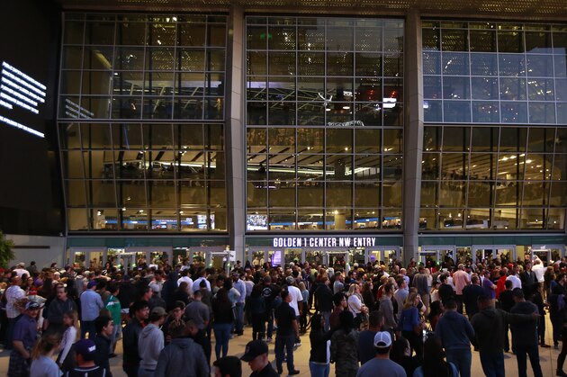 Ticket holders unable to enter the Golden 1 Center stand outside the building after protesters forced a lockdown of the arena before the Dallas Mavericks played the Sacramento Kings in an NBA basketball game Tuesday, March 27, 2018, in Sacramento, Calif. The demonstration was over the shooting death of Stephon Clark by Sacramento Police officers on March 18. (AP Photo/Rich Pedroncelli) Ticket holders unable to enter the Golden 1 Center stand outside the building after protesters forced a lockdown of the arena before the Dallas Mavericks played the Sacramento Kings in an NBA basketball game Tuesday, March 27, 2018, in Sacramento, Calif. The demonstration was over the shooting death of Stephon Clark by Sacramento Police officers on March 18. (AP Photo/Rich Pedroncelli)
