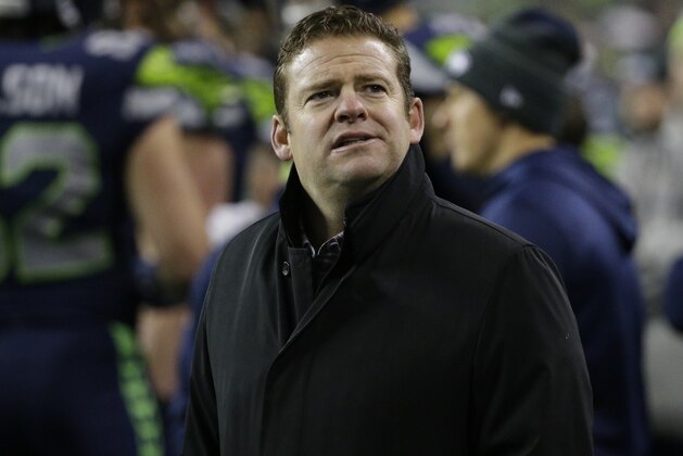 Seattle Seahawks general manager John Schneider stands on the field after an NFL football game against the Philadelphia Eagles, Sunday, Dec. 3, 2017, in Seattle. (AP Photo/Ted S. Warren)
