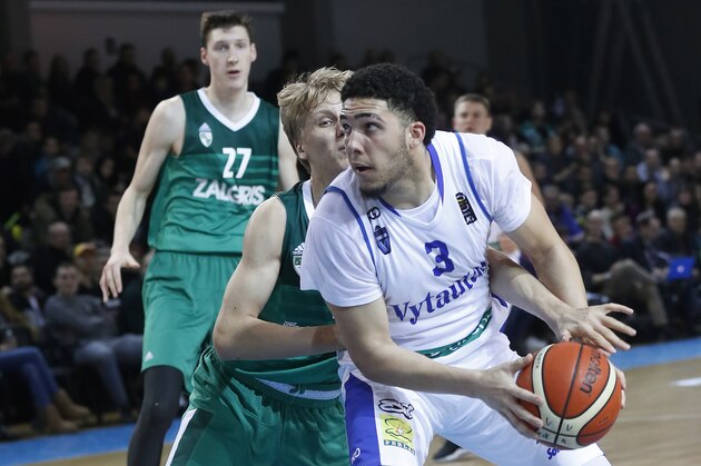 BC Prienu Vytautas's LiAngelo Ball in action during the Big Baller Brand Challenge friendly tournament match between BC Prienu Vytautas and BC Zalgiris-2 at the BC Prienai-Birstonas Vytautas arena, in Prienai, Lithuania, Tuesday, Jan. 9, 2018. LiAngelo Ball and LaMelo Ball, sons of former basketball player LaVar Ball, have signed a one-year contract and play their first match for Lithuanian professional basketball club Prienu Vytautas. (AP Photo/Liusjenas Kulbis)