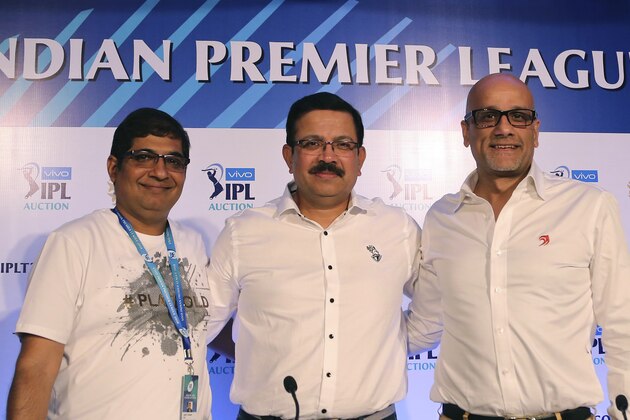 Royal Challengers Bangalore team Chairman Amrit Thomas, left, Kolkata Knight Riders team Chief Executive Officer Venky Mysore, center, and Delhi Daredevils team Chief Executive Officer Hemant Dua pose after attending a press conference on the second day of the Indian Premier League (IPL) player auction in Bangalore, India, Sunday, Jan. 28, 2018. The IPL auctions are being held in Bangalore for the eleventh edition of the domestic Twenty20 cricket tournament, which will be held at different venues across the country with eight teams participating. (AP Photo/Aijaz Rahi)