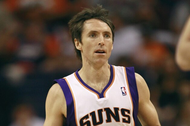 Phoenix Suns' Steve Nash (13) competes against the San Antonio Spurs during the second half of an NBA basketball game, Wednesday, April 25, 2012, in Phoenix. (AP Photo/Matt York)