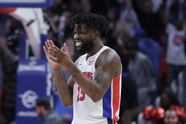 Detroit Pistons forward Reggie Bullock (25) reacts after the Pistons defeated the New York Knicks in an NBA basketball game, Friday, Dec. 22, 2017, in Detroit. (AP Photo/Carlos Osorio)
