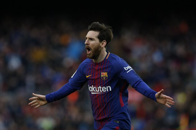 FC Barcelona's Lionel Messi reacts after scoring during the Spanish La Liga soccer match between FC Barcelona and Atletico Madrid at the Camp Nou stadium in Barcelona, Spain, Sunday, March 4, 2018. (AP Photo/Manu Fernandez)