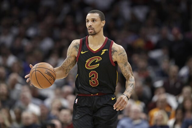 Cleveland Cavaliers' George Hill drives against Milwaukee Bucks in the first half of an NBA basketball game, Monday, March 19, 2018, in Cleveland. (AP Photo/Tony Dejak)