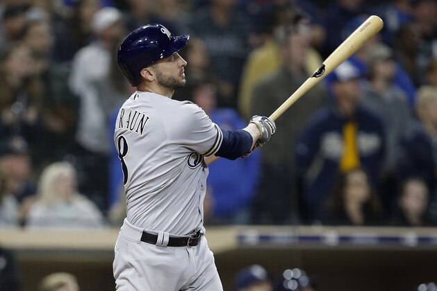 Milwaukee Brewers' Ryan Braun hits a 3-run home run against the San Diego Padres during the ninth inning of a baseball game in San Diego, Friday, March 30, 2018. The Brewers won 8-6. (AP Photo/Alex Gallardo)