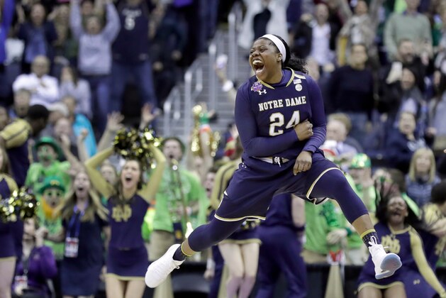 Notre Dame's Arike Ogunbowale celebrates after making the game-winning basket during overtime against Connecticut in the semifinals of the women's NCAA Final Four college basketball tournament, Friday, March 30, 2018, in Columbus, Ohio. Notre Dame won 91-89. (AP Photo/Ron Schwane)