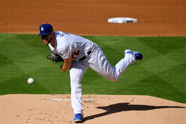 Los Angeles Dodgers starting pitcher Clayton Kershaw throws to the plate during the first inning of an opening day baseball game against the San Francisco Giants, Thursday, March 29, 2018, in Los Angeles. (AP Photo/Mark J. Terrill)