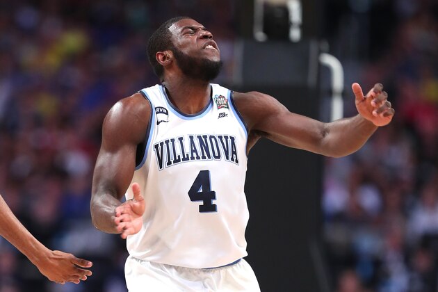 SAN ANTONIO, TX - MARCH 31: Eric Paschall #4 of the Villanova Wildcats reacts after a play in the first half against the Kansas Jayhawks during the 2018 NCAA Men's Final Four Semifinal at the Alamodome on March 31, 2018 in San Antonio, Texas.  (Photo by Tom Pennington/Getty Images)