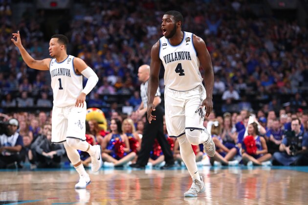 SAN ANTONIO, TX - MARCH 31:  Eric Paschall #4 of the Villanova Wildcats reacts in the first half against the Kansas Jayhawks during the 2018 NCAA Men's Final Four Semifinal at the Alamodome on March 31, 2018 in San Antonio, Texas.  (Photo by Tom Pennington/Getty Images)