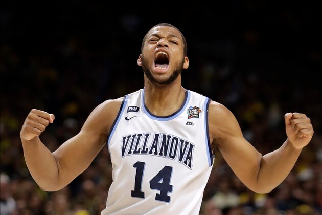 Villanova forward Omari Spellman celebrates during the first half against Kansas in the semifinals of the Final Four NCAA college basketball tournament, Saturday, March 31, 2018, in San Antonio. (AP Photo/Eric Gay)