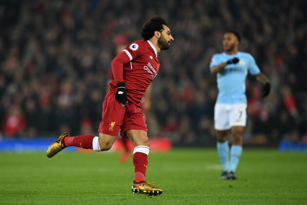 LIVERPOOL, ENGLAND - JANUARY 14:  Mohamed Salah of Liverpool celebrates after scoring the fourth Liverpool goal during the Premier League match between Liverpool and Manchester City at Anfield on January 14, 2018 in Liverpool, England.  (Photo by Shaun Botterill/Getty Images)