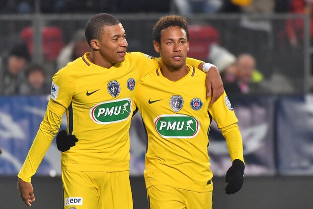 Paris Saint-Germain's Brazilian forward Neymar (R) celebrates after scoring with Paris Saint-Germain's French forward Kylian Mbappe during the French cup football match Rennes vs Paris SG at the Roazhon Park in Rennes, on January 7, 2018.     / AFP PHOTO / LOIC VENANCE        (Photo credit should read LOIC VENANCE/AFP/Getty Images)
