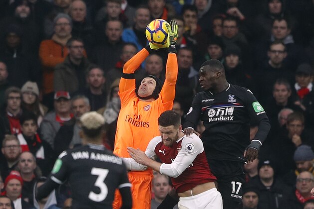 Arsenal's goalkeeper Petr Cech makes a save during the English Premier League soccer match between Arsenal and Crystal Palace at the Emirates stadium in London, Saturday, Jan. 20, 2018.(AP Photo/Frank Augstein)