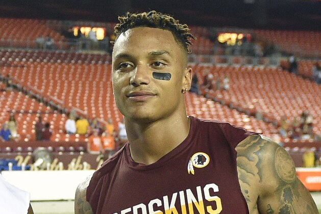 FILE - In this Aug. 26, 2016, file photo, Washington Redskins' Su'a Cravens is shown after an NFL preseason football game against Buffalo, in Landover, Md. A person with knowledge of the deal says the Denver Broncos have acquired safety Su'a Cravens from the Washington Redskins. The person spoke to The Associated Press on condition of anonymity Wednesday, March 28, 2018, because the teams had not announced the deal. (AP Photo/Nick Wass, File)