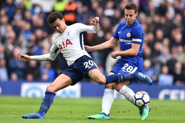 TOPSHOT - Tottenham Hotspur's English midfielder Dele Alli (L) vies with Chelsea's Spanish defender Cesar Azpilicueta during the English Premier League football match between Chelsea and Tottenham Hotspur at Stamford Bridge in London on April 1, 2018. / AFP PHOTO / Glyn KIRK / RESTRICTED TO EDITORIAL USE. No use with unauthorized audio, video, data, fixture lists, club/league logos or 'live' services. Online in-match use limited to 75 images, no video emulation. No use in betting, games or single club/league/player publications.  /         (Photo credit should read GLYN KIRK/AFP/Getty Images)