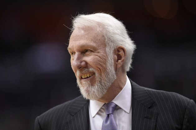 San Antonio Spurs coach Gregg Popovich reacts during the second half of the team's NBA basketball game against the Washington Wizards, Tuesday, March 27, 2018, in Washington. The Wizards won 116-106. (AP Photo/Nick Wass)