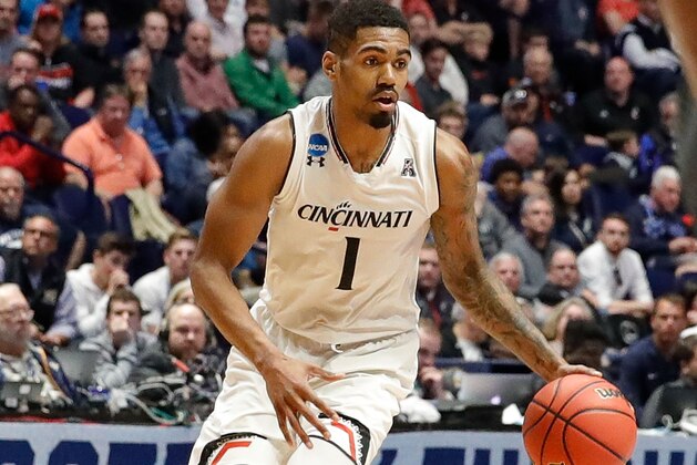 NASHVILLE, TN - MARCH 18:  Jacob Evans #1 of the Cincinnati Bearcats plays against the Nevada Wolf Pack during the second round of the 2018 NCAA Men's Basketball Tournament at Bridgestone Arena on March 18, 2018 in Nashville, Tennessee.  (Photo by Frederick Breedon/Getty Images)