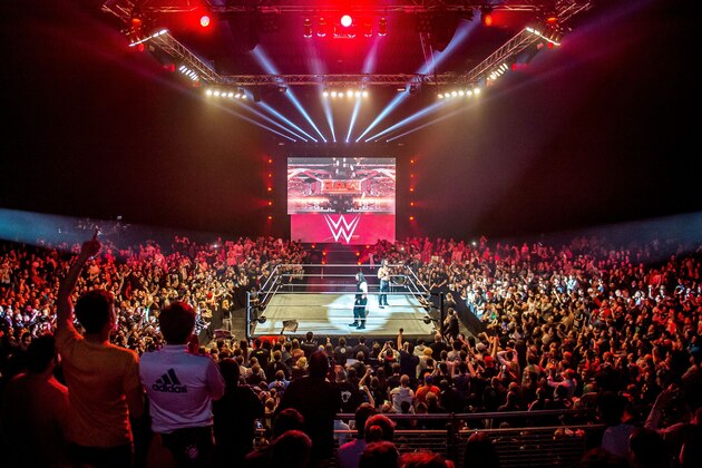 Roman and Seth celebrate in the ring during the WWE show at Zenith Arena on may 09, 2017 in Lille, France. / AFP PHOTO / PHILIPPE HUGUEN        (Photo credit should read PHILIPPE HUGUEN/AFP/Getty Images)