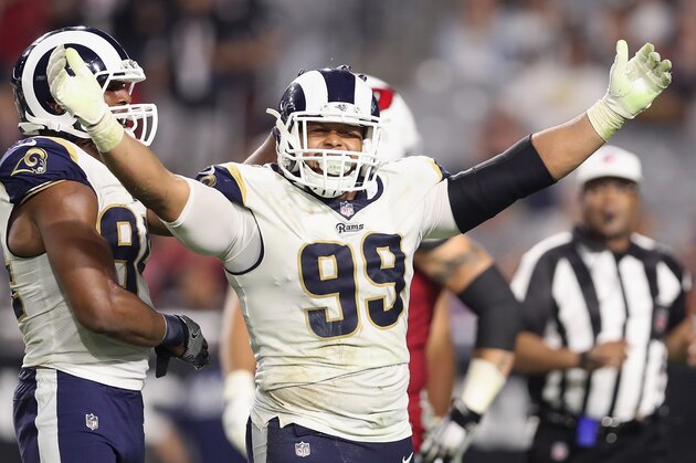 GLENDALE, AZ - DECEMBER 03:  Defensive end Aaron Donald #99 of the Los Angeles Rams reacts after a tackle against the Arizona Cardinals during the second half of the NFL game at the University of Phoenix Stadium on December 3, 2017 in Glendale, Arizona.  The Rams defeated the Cardinals 32-16.  (Photo by Christian Petersen/Getty Images)