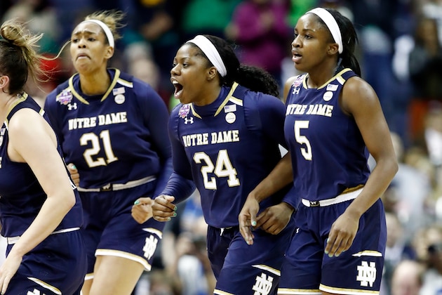 COLUMBUS, OH - APRIL 01:  Kristina Nelson #21, Arike Ogunbowale #24 and Jackie Young #5 of the Notre Dame Fighting Irish celebrate their comeback during the third quarter against the Mississippi State Lady Bulldogs in the championship game of the 2018 NCAA Women's Final Four at Nationwide Arena on April 1, 2018 in Columbus, Ohio.  (Photo by Andy Lyons/Getty Images)