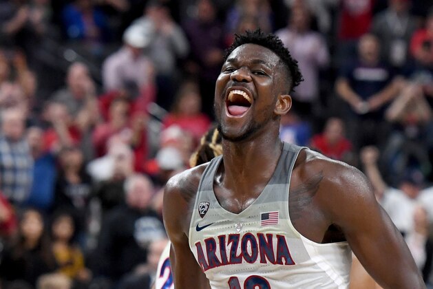 LAS VEGAS, NV - MARCH 10:  Deandre Ayton #13 of the Arizona Wildcats celebrates on the court after the team defeated the USC Trojans 75-61 to win the championship game of the Pac-12 basketball tournament at T-Mobile Arena on March 10, 2018 in Las Vegas, Nevada.  (Photo by Ethan Miller/Getty Images)