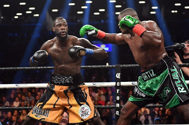 Heavyweight champion Deontay Wilder of the US fights contender Luis Ortiz of Cuba during their WBC heavyweight title fight in New York on March 3, 2018. / AFP PHOTO / Timothy A. CLARY        (Photo credit should read TIMOTHY A. CLARY/AFP/Getty Images)