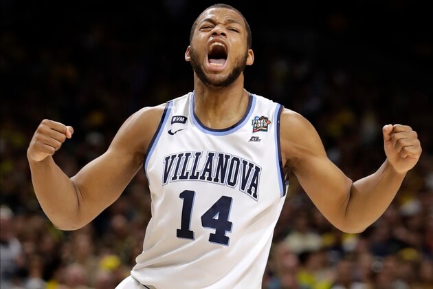Villanova forward Omari Spellman celebrates during the first half against Kansas in the semifinals of the Final Four NCAA college basketball tournament, Saturday, March 31, 2018, in San Antonio. (AP Photo/Eric Gay)