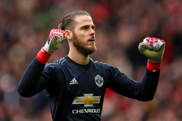 MANCHESTER, ENGLAND - MARCH 31: David de Gea of Manchester United celebrates the first goal during the Premier League match between Manchester United and Swansea City at Old Trafford on March 31, 2018 in Manchester, England. (Photo by Robbie Jay Barratt - AMA/Getty Images)