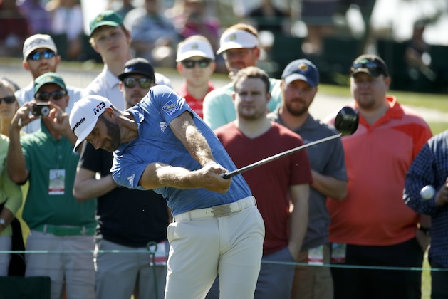 Dustin Johnson hits his tee shot on the third hole during practice for the Masters golf tournament at Augusta National Golf Club, Monday, April 2, 2018, in Augusta, Ga. (AP Photo/Charlie Riedel)