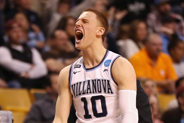 SAN ANTONIO, TX - APRIL 02:  Donte DiVincenzo #10 of the Villanova Wildcats celebrates with teammates after defeating the Michigan Wolverines during the 2018 NCAA Men's Final Four National Championship game at the Alamodome on April 2, 2018 in San Antonio, Texas. Villanova defeated Michigan 79-62.  (Photo by Tom Pennington/Getty Images)