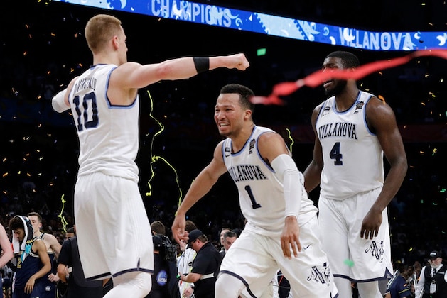 Villanova's Donte DiVincenzo (10) and Jalen Brunson (1) celerbate after the championship game of the Final Four NCAA college basketball tournament against Michigan, Monday, April 2, 2018, in San Antonio. Villanova won 79-62. (AP Photo/David J. Phillip)