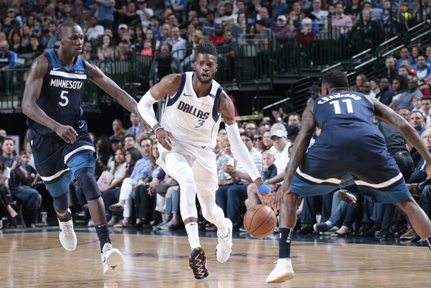 DALLAS, TX - MARCH 30: Nerlens Noel #3 of the Dallas Mavericks handles the ball against the Minnesota Timberwolves on March 30, 2018 at the American Airlines Center in Dallas, Texas. NOTE TO USER: User expressly acknowledges and agrees that, by downloading and or using this photograph, User is consenting to the terms and conditions of the Getty Images License Agreement. Mandatory Copyright Notice: Copyright 2018 NBAE (Photo by Glenn James/NBAE via Getty Images)