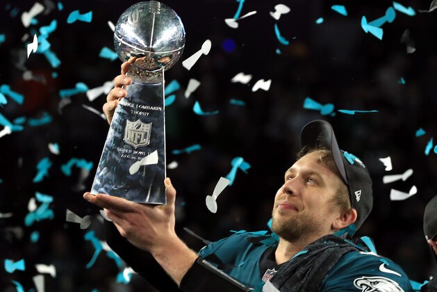 MINNEAPOLIS, MN - FEBRUARY 04:  Nick Foles #9 of the Philadelphia Eagles celebrates with the Lombardi Trophy after defeating the New England Patriots 41-33 in Super Bowl LII at U.S. Bank Stadium on February 4, 2018 in Minneapolis, Minnesota.  (Photo by Mike Ehrmann/Getty Images)