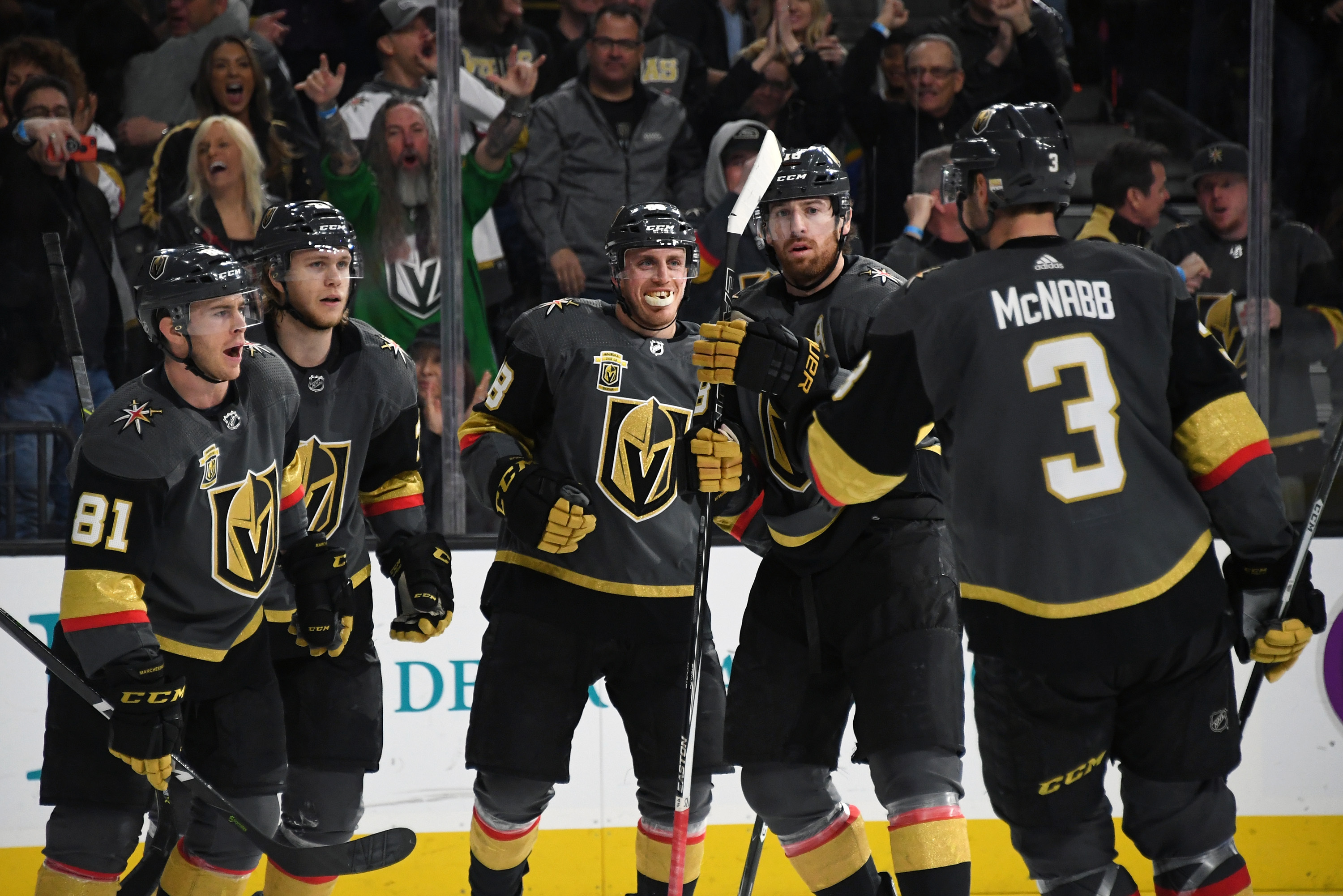 LAS VEGAS, NV - MARCH 18:  (L-R) Jonathan Marchessault #81, William Karlsson #71, Nate Schmidt #88, James Neal #18 and Brayden McNabb #3 of the Vegas Golden Knights celebrate on the ice after Karlsson scored the first of his three goals in the second period against the Calgary Flames during their game at T-Mobile Arena on March 18, 2018 in Las Vegas, Nevada. The Golden Knights won 4-0.  (Photo by Ethan Miller/Getty Images)