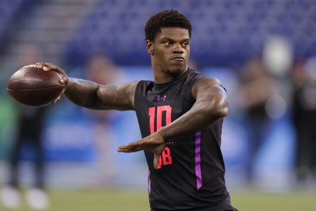 Louisville quarterback Lamar Jackson runs a drill at the NFL football scouting combine in Indianapolis, Saturday, March 3, 2018. (AP Photo/Michael Conroy)