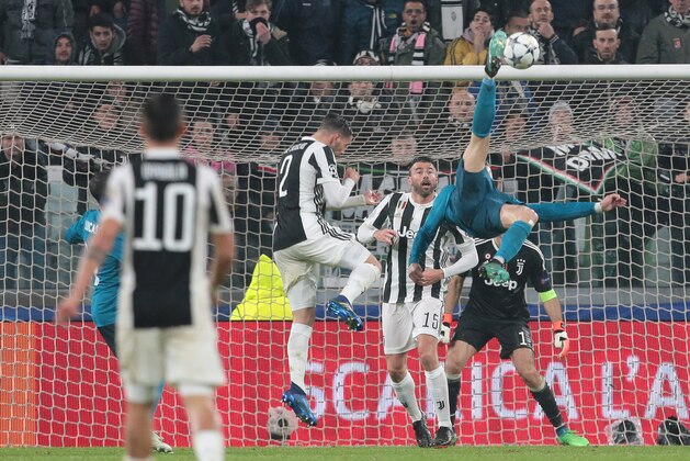 TURIN, ITALY - APRIL 03:  Cristiano Ronaldo of Real Madrid scores his sides second goal during the UEFA Champions League Quarter Final Leg One match between Juventus and Real Madrid at Allianz Stadium on April 3, 2018 in Turin, Italy.  (Photo by Emilio Andreoli/Getty Images)