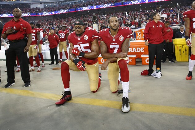 SANTA CLARA, CA - SEPTEMBER 12: Eric Reid #35 and Colin Kaepernick #7 of the San Francisco 49ers kneel during the anthem prior to the game against the Los Angeles Rams at Levi Stadium on September 12, 2016 in Santa Clara, California. The 49ers defeated the Rams 28-0. (Photo by Michael Zagaris/San Francisco 49ers/Getty Images) *** Local Caption *** SANTA CLARA, CA - SEPTEMBER 12: Eric Reid #35 and Colin Kaepernick #7 of the San Francisco 49ers kneel during the anthem prior to the game against the Los Angeles Rams at Levi Stadium on September 12, 2016 in Santa Clara, California. The 49ers defeated the Rams 28-0. (Photo by Michael Zagaris/San Francisco 49ers/Getty Images) *** Local Caption ***