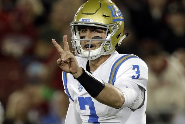 UCLA quarterback Josh Rosen signals during the first half of an NCAA college football game against Stanford on Saturday, Sept. 23, 2017, in Stanford, Calif. (AP Photo/Marcio Jose Sanchez)