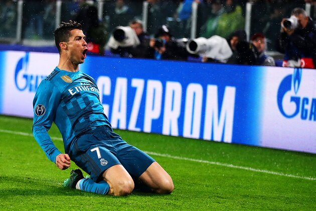 TURIN, ITALY - APRIL 03: Cristiano Ronaldo of Real Madrid celebrates after scoring the opening goal during the UEFA Champions League Quarter Final, first leg match between Juventus and Real Madrid at Juventus Stadium on April 3, 2018 in Turin, Italy.  (Photo by Chris Brunskill Ltd/Getty Images)