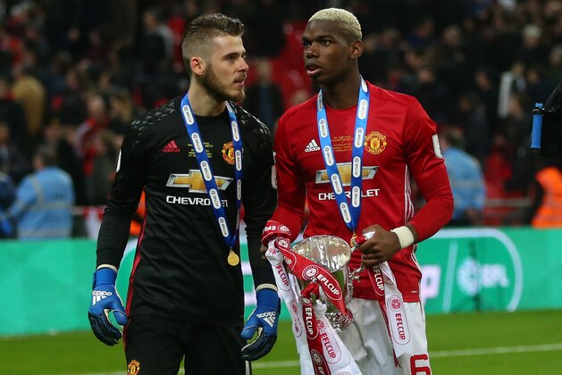 LONDON, ENGLAND - FEBRUARY 26: David de Gea and Paul Pogba of Manchester United with the trophy during the EFL Cup Final match between Manchester United and Southampton at Wembley Stadium on February 26, 2017 in London, England. (Photo by Catherine Ivill - AMA/Getty Images)