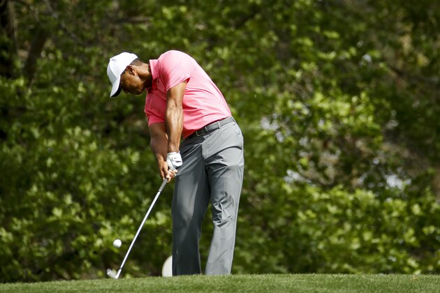Tiger Woods hits his tee shot on the fourth hole during practice for the Masters golf tournament at Augusta National Golf Club, Monday, April 2, 2018, in Augusta, Ga. (AP Photo/Charlie Riedel)