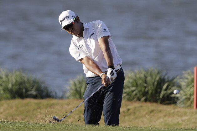 Hideki Matsuyama of Japan plays a shot from a bunker on the 14th hole during round-robin play at the Dell Technologies Match Play golf tournament, Thursday, March 22, 2018, in Austin, Texas. (AP Photo/Eric Gay)