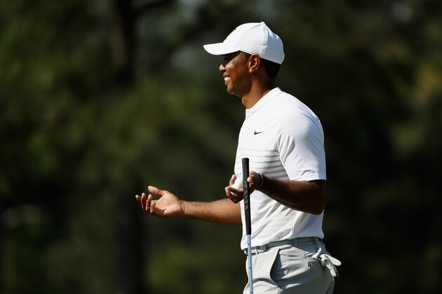AUGUSTA, GA - APRIL 03: Tiger Woods of the United States reacts on the 17th hole  during a practice round prior to the start of the 2018 Masters Tournament at Augusta National Golf Club on April 3, 2018 in Augusta, Georgia.  (Photo by Jamie Squire/Getty Images)