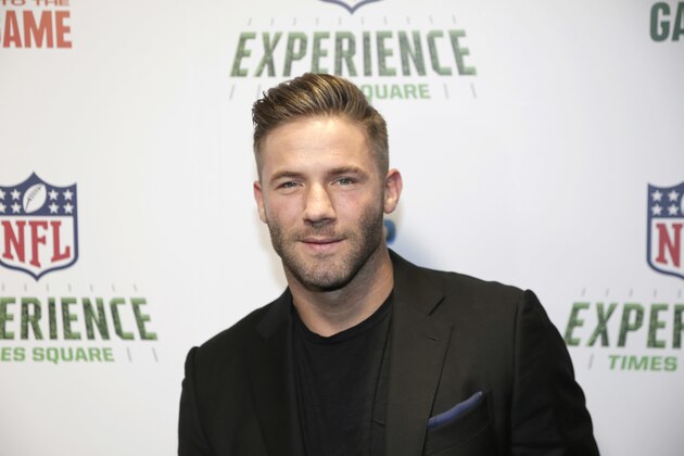New England Patriots Julian Edelman poses for a picture at the opening of