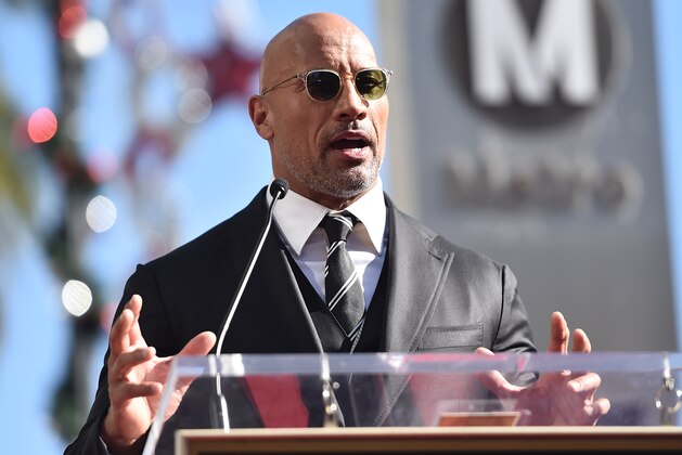 HOLLYWOOD, CA - DECEMBER 13:  Actor Dwayne Johnson attends a ceremony honoring him with the 2,624th star on the Hollywood Walk of Fame on December 13, 2017 in Hollywood, California.  (Photo by Alberto E. Rodriguez/Getty Images)