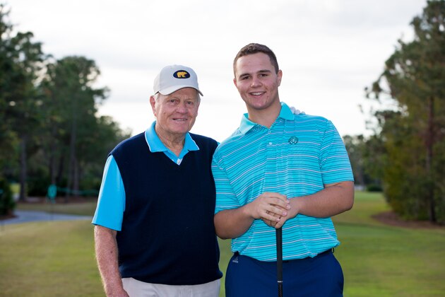ORLANDO, FL - DECEMBER 15: Jack Nicklaus and his grandson Gary Nicklaus Jr. pose for a photo on the first tee during the second round of the PNC Father/Son Challenge at The Ritz-Carlton Golf Club on December 15, 2017 in Orlando, Florida. (Photo by Manuela Davies/Getty Images)